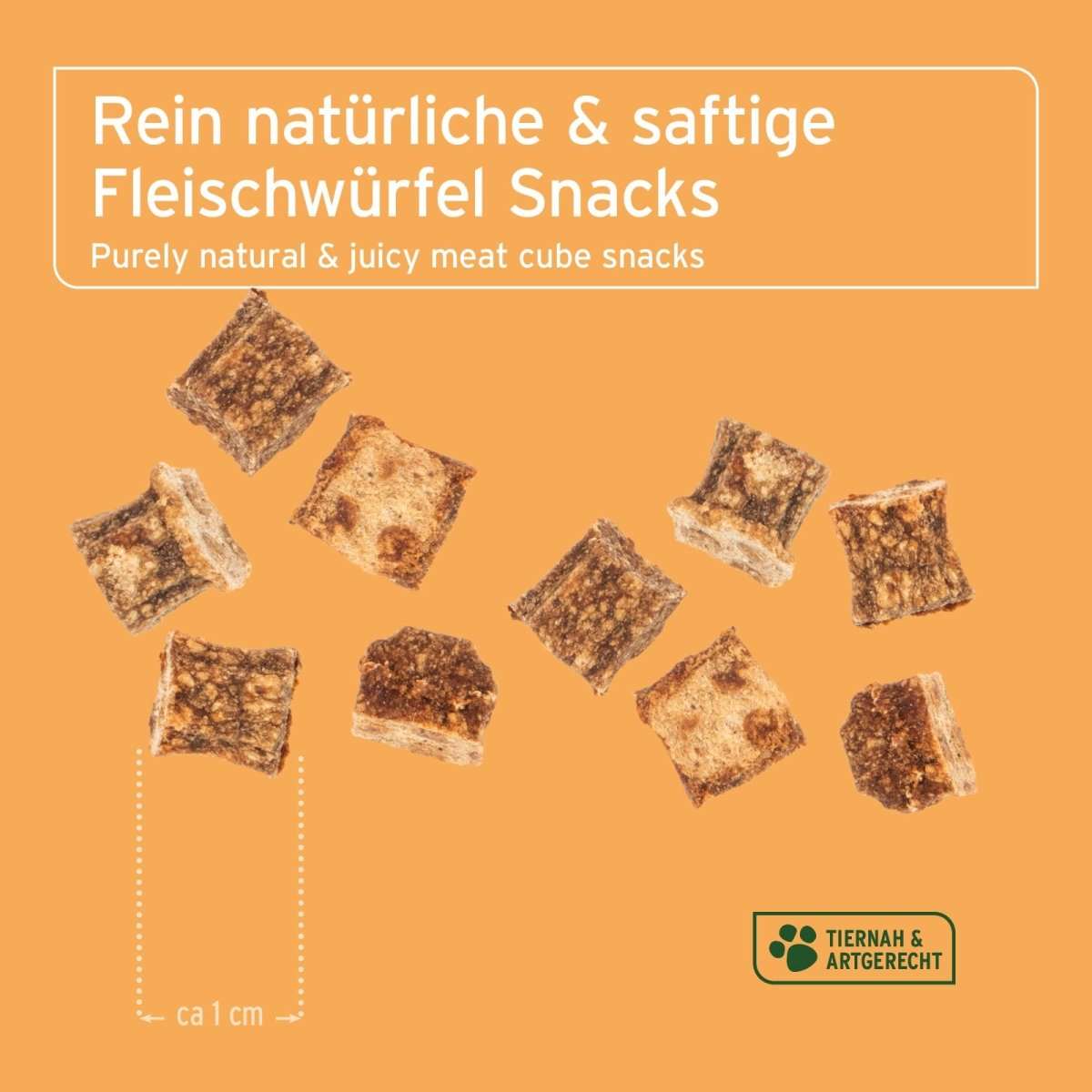 Dog Snacks aus Hühnerfleisch auf orangem Hintergrund.